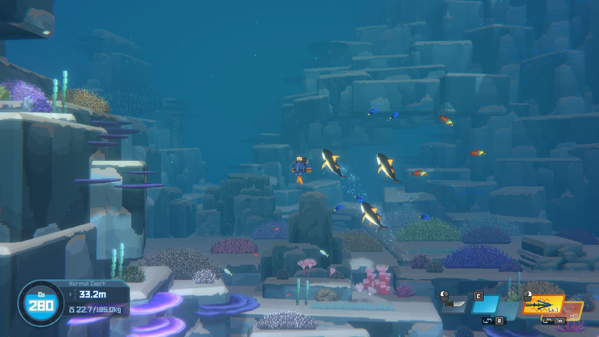 Dave swimming next to three tunas speeding by in Dave the Diver