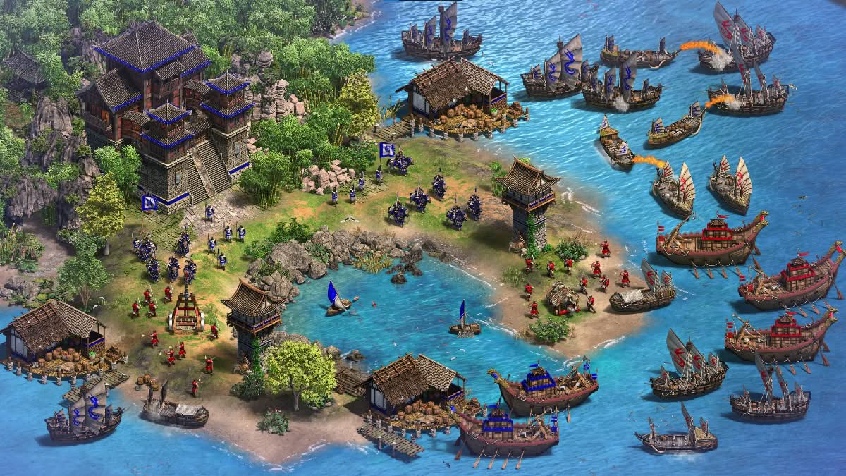 Age of Empires 2 Definitive Edition Three Kingdoms expansion, fleet attacking an island defended by a fortress