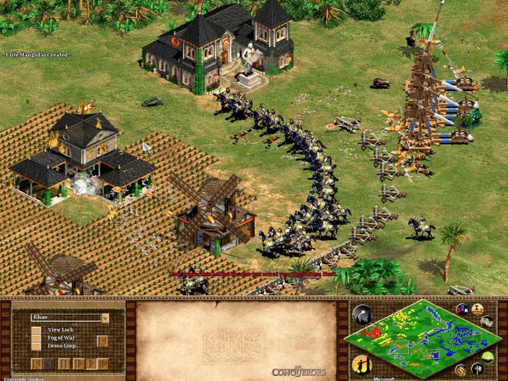 Age of Empires 2 original, army with knights, scorpions and trebuchets destroying an enemy base