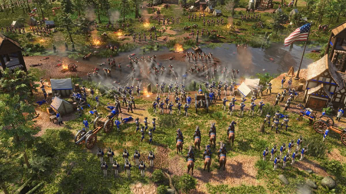 Age of Empires 3 Definitive Edition, large pitched battle with red forces to the north, blue to the south and an American flag raised high