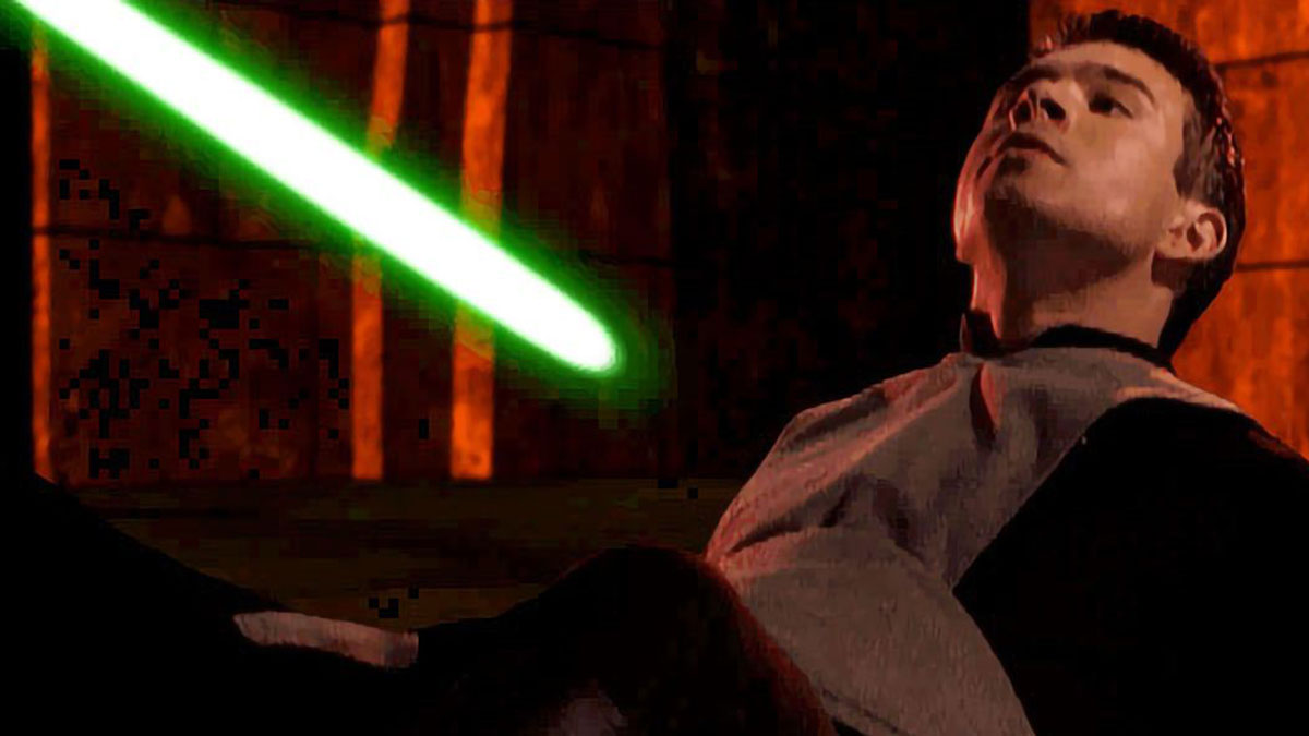 Kyle Katarn tenant un sabre laser vert au-dessus d'un Jedi Noir vaincu au sol