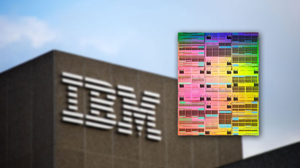 IBM 0.7nm nanostack chip showcased in front of a blurred IBM facility