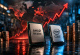 Intel and AMD processors placed over a world map with a sharply rising stock market trend line